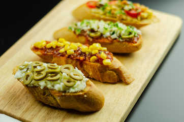 traditional spanish tapas for lunch table, mini sandwiches food set,  delicious snack appetizer