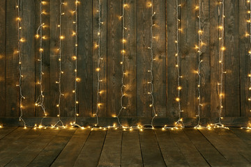 holiday lights on dark wood background