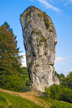 Pieskowa Skala, Poland - Monumental limestone rock Cudgel or Bludgeon of Hercules - Maczuga Herkulesa - in the Ojcowski National Park