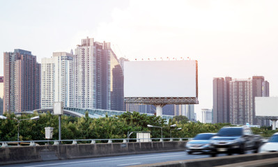 blank big billboard on highway in city town - obrazy, fototapety, plakaty
