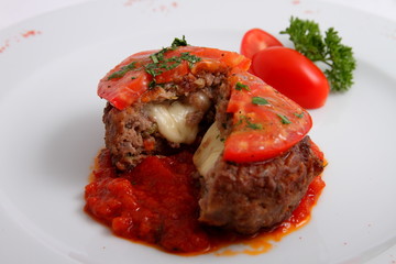cutlet with cheese and tomatoes