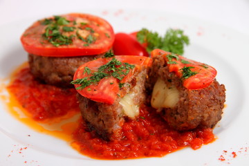 cutlet with cheese and tomatoes