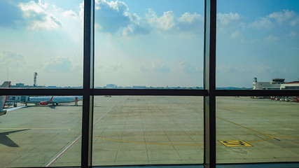 View from airport terminal with blue sky and white cloud in vacation time