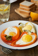Baked bell pepper with egg in a bowl