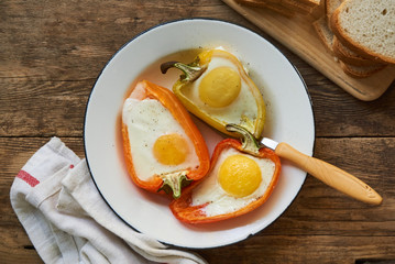 Baked bell pepper with egg in a bowl