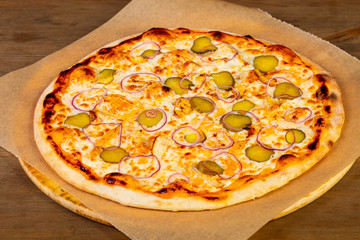 Pizza with pickled cucumbers