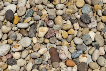 Sea stones. Stone background for tiles, facades of houses.