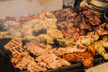 Grilled meat at a food stall in Antigua Guatemala city.