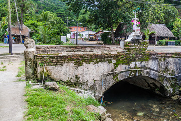 PORTOBELO, PANAMA  - MAY 28, 2016: Old dilapidated bridge in Portobelo village, Panama
