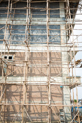 building at construction site, property and real estate industrial is concept