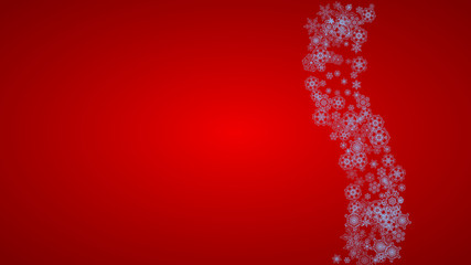 Christmas frame with snowflakes on red background. Santa Claus colors. Horizontal Christmas frame for holiday banners, cards, sales, special offers. Falling snow with bokeh and flakes for celebration