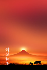 富士山の日の出とイノシシのシルエット