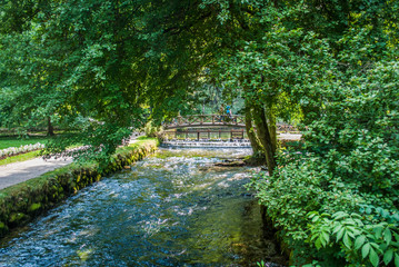 Fototapeta na wymiar Beginning river Bosna at Nature park Vrelo Bosne