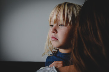 sad crying little girl hugging mother, parenting