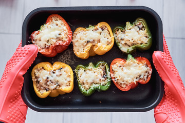 Stuffed colorful peppers with rice and vegetables