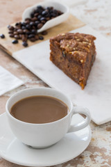 carrot cake with coffee on white