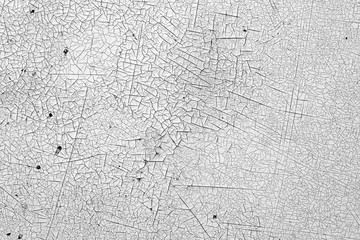 Crack and damage on painted texture in black and white.