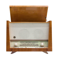 Old vintage radio with open record player lid isolated on white background