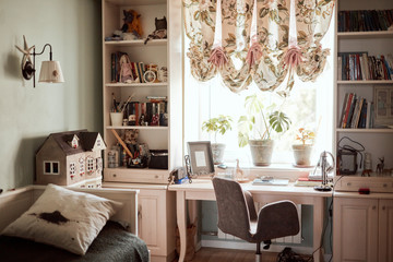 room interior with place for work and sleeping area