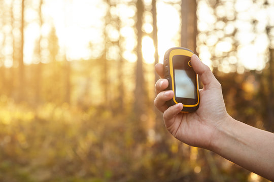 Tourist Holding Gps Tracker. Finding Right Way.