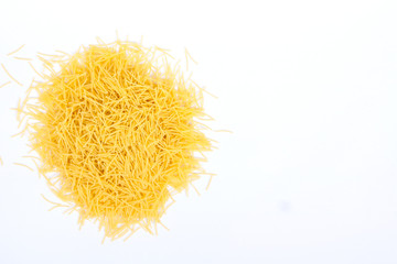 Stack of vermicelli or pasta on a white background. Top view.