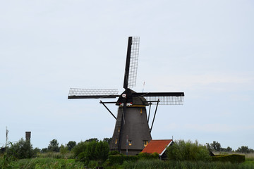 Fototapeta na wymiar Kinderdijk, Netherlands - Windmills along the canals of the UNESCO World Heritage Kinderdijk