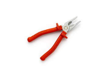 close up of an old red lineman's pliers, isolated on white