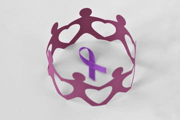Paper people in a circle around violet ribbon on white background - Concept of Domestic Violence...