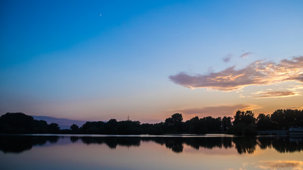 Beautiful sunset with reflections near Plattling - Isar - Bavaria - Germany