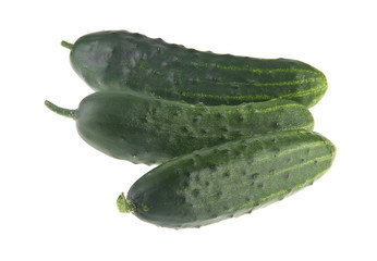 green, fresh, juicy cucumbers isolated on white background