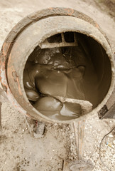 Mixing of concrete in a concrete mixer
