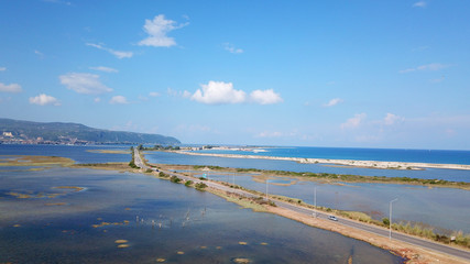 Aerial drone view of Lefkada Canal a natural entrance to the island with swamp like landscape near castle of Agia Mavra, Ionian, Greece