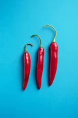 Fotobehang Red chilli peppers © Dreava