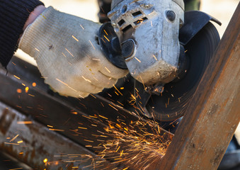 Sparks from cutting metal on the rack