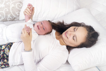 Mother  and baby in bed