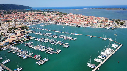 Aerial drone bird's eye view photo from popular Marina full of yachts and sail boats in Lefkada city waterfront, Ionian, Greece