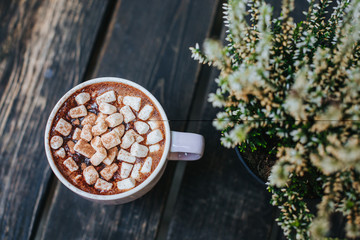 Aroma coffee cup with roasted beans on vintage old background