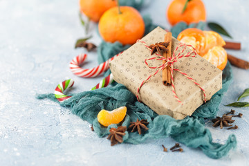 Christmas gift box, candy cane, tangerines