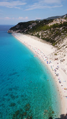 Aerial drone bird's eye view photo of small rocky beach next to iconic beach of Milos and Agios Nikitas in island of Lefkada, Ionian, Greece