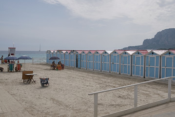 Fototapeta na wymiar Modello, Italy - September 10, 2018 : View of the beach club changing rooms in Mondello