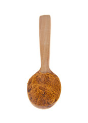 red pepper in a wooden spoon isolated on a white background. Ideal for packing.