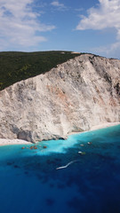 Fototapeta premium Aerial drone photo of tropical caribbean bay with white sand beach and beautiful turquoise and sapphire clear sea