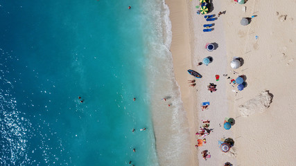 Fototapeta na wymiar Aerial drone photo of tropical caribbean bay with white sand beach and beautiful turquoise and sapphire clear sea
