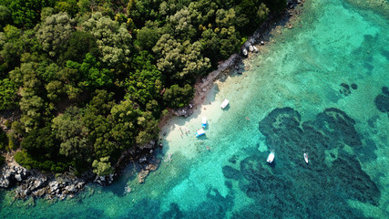 Aerial drone bird's eye view photo of famous sandy beach and small island of Agia Paraskevi with emerald clear sea, Thesprotia, Epirus, Greece