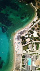 Aerial drone bird's eye view photo of famous sandy beach and small island of Agia Paraskevi with...
