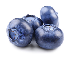Ripe blueberries on white background