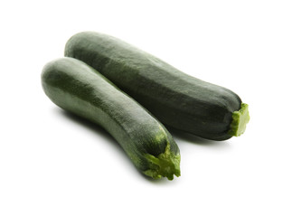 Fresh zucchinis on white background