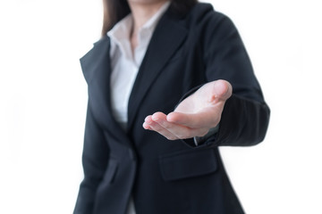 Business woman in black suit open hand for show something on white background.