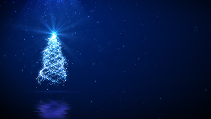 Christmas tree on blue background with space for your text.