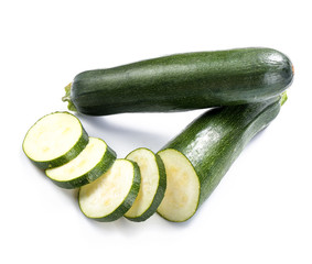 Fresh zucchinis on white background